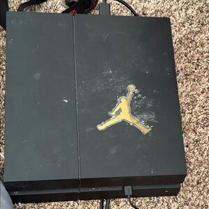 Sony Black PlayStation 4 Slim with Gold Jumpman Accent